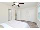 Bedroom showcasing multiple closets and a neutral palette, offering ample storage and natural light at 8221 Pineville Matthews Rd # A, Charlotte, NC 28226