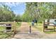 Entrance to McMullen Creek Greenway with picnic area and path at 8221 Pineville Matthews Rd # A, Charlotte, NC 28226