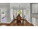 Charming breakfast nook features a round table, hardwood floors, and plenty of natural light at 9008 Skipaway Dr, Waxhaw, NC 28173