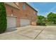This home has a three car garage and well-maintained landscaping, enhancing the property's curb appeal at 9008 Skipaway Dr, Waxhaw, NC 28173