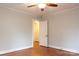Bedroom featuring hardwood floors, neutral wall color and views to other rooms at 920 N Sixth St, Albemarle, NC 28001