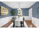 Stylish dining room featuring a view of the backyard and a connection to the kitchen at 9319 Harps Mill Ct, Charlotte, NC 28270