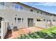 Charming home features a cozy back patio, a fenced yard, and a grassy area at 9551 Glenburn Ln, Charlotte, NC 28278