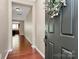 Welcoming foyer with hardwood floors and a view of the living area at 9551 Glenburn Ln, Charlotte, NC 28278