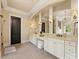Bathroom with a double sink vanity, framed mirrors and great lighting at 1012 Shippon Ln, Waxhaw, NC 28173