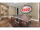 Recreational room featuring a ping pong table and unique vintage signage at 1012 Shippon Ln, Waxhaw, NC 28173