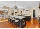 Expansive kitchen with double islands, counter seating, and custom cabinetry, perfect for entertaining at 1012 Shippon Ln, Waxhaw, NC 28173