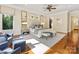 Spacious main bedroom featuring a sitting area, large bed, and windows at 1012 Shippon Ln, Waxhaw, NC 28173
