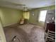 Bedroom with a ceiling fan, neutral carpet, and lots of natural light at 112 Juanita Dr, Pineville, NC 28134