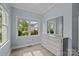 Bright bedroom with large window and neutral paint at 116 Jim Parker Rd, Wesley Chapel, NC 28110