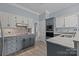 Well-lit kitchen featuring granite countertops and stainless steel appliances at 116 Jim Parker Rd, Wesley Chapel, NC 28110