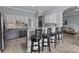 Modern kitchen featuring stainless steel appliances and a breakfast bar with seating at 116 Jim Parker Rd, Wesley Chapel, NC 28110