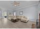 Spacious living room featuring comfortable seating and a cozy fireplace at 116 Jim Parker Rd, Wesley Chapel, NC 28110