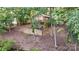 Beautiful home featuring a deck, lower patio, and lake views at 119 Harbor Ln, Mount Gilead, NC 27306