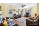 Relaxing living room featuring leather furniture, hardwood floors, and natural light at 121 Talbert Town Loop, Mooresville, NC 28117