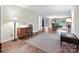 Basement area showcasing wood-look flooring and an open floorplan with space for a desk and a seating area at 1231 Restoration Dr, Marvin, NC 28173
