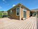 Spacious wood deck with sliding glass door and view of the backyard at 1231 Restoration Dr, Marvin, NC 28173