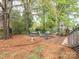 Backyard patio area has brick pavers and outdoor seating, perfect for relaxing at 126 Pointer Se Ct, Concord, NC 28025