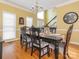 Dining room featuring a chandelier and hardwood floors at 126 Pointer Se Ct, Concord, NC 28025