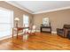 Comfortable living room with natural lighting, hardwood floors, and classic furniture, perfect for relaxation at 126 Pointer Se Ct, Concord, NC 28025