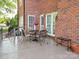 Outdoor patio features a table with four chairs under a patio umbrella at 126 Pointer Se Ct, Concord, NC 28025