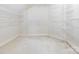 Spacious walk-in closet with ample shelving and organizational space for clothes and accessories at 126 Pointer Se Ct, Concord, NC 28025