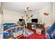 bedroom features red carpet, ceiling fan, and bed with gaming setup at 140 Misty Ln, Rockwell, NC 28138