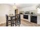 Well-lit kitchen showcases updated appliances, counter tops, and tile backsplash at 140 Misty Ln, Rockwell, NC 28138