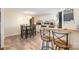 The eat-in kitchen features modern flooring and functional bar seating at 140 Misty Ln, Rockwell, NC 28138