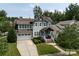 Charming home with a two-car garage, well-manicured lawn, and covered front porch at 1550 Matthew Mcclure Cir, Davidson, NC 28036