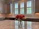 Beautiful kitchen featuring marble countertops, neutral backsplash, and lots of natural light at 1550 Matthew Mcclure Cir, Davidson, NC 28036