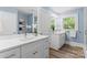 Elegant bathroom featuring double sinks and modern fixtures at 166 Franklin Nw Ave, Concord, NC 28025