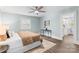 Cozy bedroom features a ceiling fan and a connecting bathroom at 166 Franklin Nw Ave, Concord, NC 28025