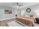 Spacious bedroom with stylish art and lots of natural light at 166 Franklin Nw Ave, Concord, NC 28025
