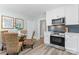 Well-lit kitchen with modern stainless steel appliances, a glass top table, and stylish backsplash at 166 Franklin Nw Ave, Concord, NC 28025