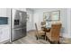 Modern kitchen featuring a stainless steel refrigerator and a breakfast table at 166 Franklin Nw Ave, Concord, NC 28025