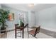 Bright office space with a stylish desk and a large plant for a touch of nature at 166 Franklin Nw Ave, Concord, NC 28025