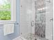 Modern shower with sleek glass door and stylish tile design at 166 Franklin Nw Ave, Concord, NC 28025