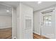Entryway featuring a white door and neutral-toned walls and flooring at 170 Dusty Loop Dr, Mount Gilead, NC 27306
