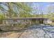Charming single-story home with a covered porch and gravel driveway at 170 Dusty Loop Dr, Mount Gilead, NC 27306