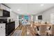 Inviting living and dining area with modern decor and wood-look flooring at 170 Dusty Loop Dr, Mount Gilead, NC 27306