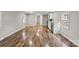 Open-concept space showcasing stylish wood-look floors and bright, neutral walls at 170 Dusty Loop Dr, Mount Gilead, NC 27306