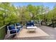 Outdoor deck featuring an outdoor seating area with comfortable seating and a wooded view at 1809 Robbins Meadows Dr, Waxhaw, NC 28173