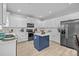 Spacious, bright eat-in kitchen with island, stainless steel appliances and pendant lighting at 1809 Robbins Meadows Dr, Waxhaw, NC 28173