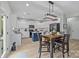 Charming eat-in kitchen with stainless steel appliances and light countertops with navy island at 1809 Robbins Meadows Dr, Waxhaw, NC 28173