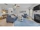 Cozy living room with plenty of seating, a fireplace, neutral paint and wood flooring at 1809 Robbins Meadows Dr, Waxhaw, NC 28173