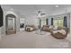 Spacious living room with neutral walls, carpet, recessed lighting and comfortable seating at 1809 Robbins Meadows Dr, Waxhaw, NC 28173