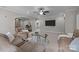 Expansive living room with neutral walls, carpet, recessed lighting and ample seating at 1809 Robbins Meadows Dr, Waxhaw, NC 28173