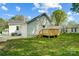 This home has a quaint wooden deck and a lush green backyard, perfect for outdoor living at 1901 Parkdale Ave, Gastonia, NC 28052