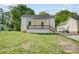 Inviting single-story house with a charming porch and a neatly kept front yard at 1901 Parkdale Ave, Gastonia, NC 28052